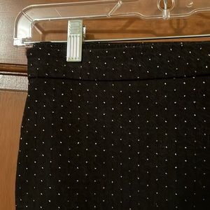 Black pants with metallic gold dots